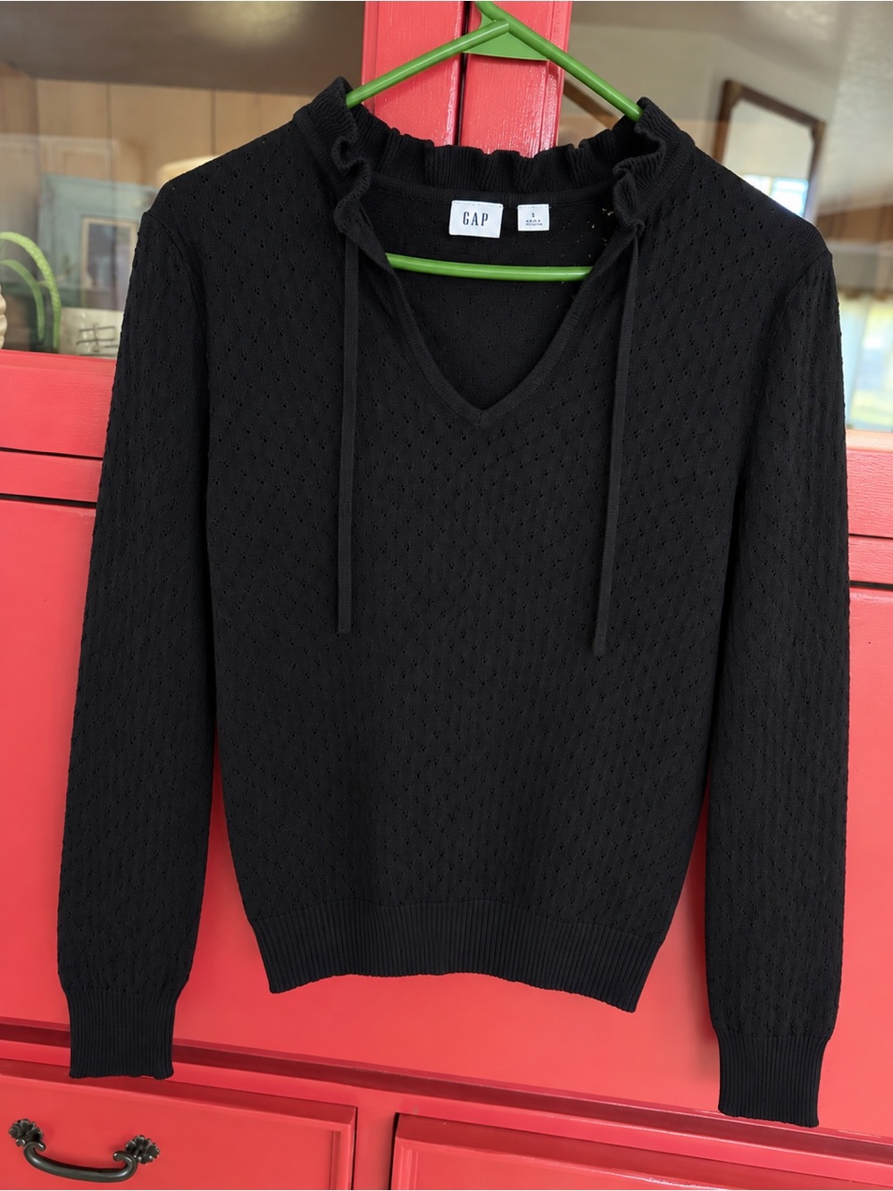 GAP 100% cotton eyelet black top with tie feature. NWT